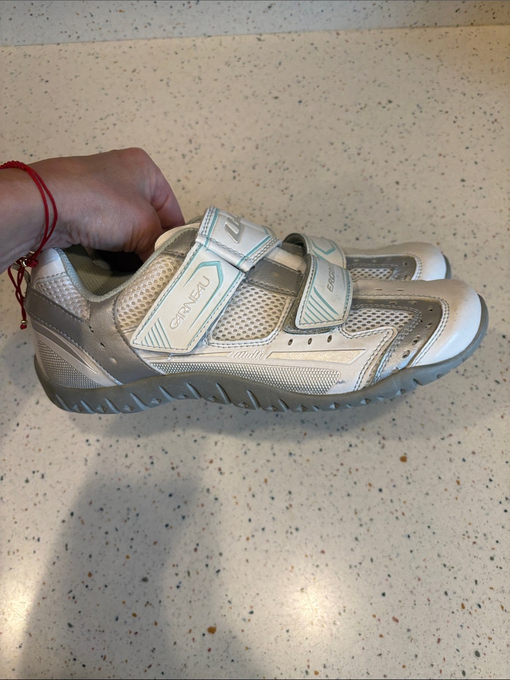 Woman’s bike shoes with clips for spin classes at the gym, never worn outside